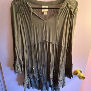 Woman’s grey blouse